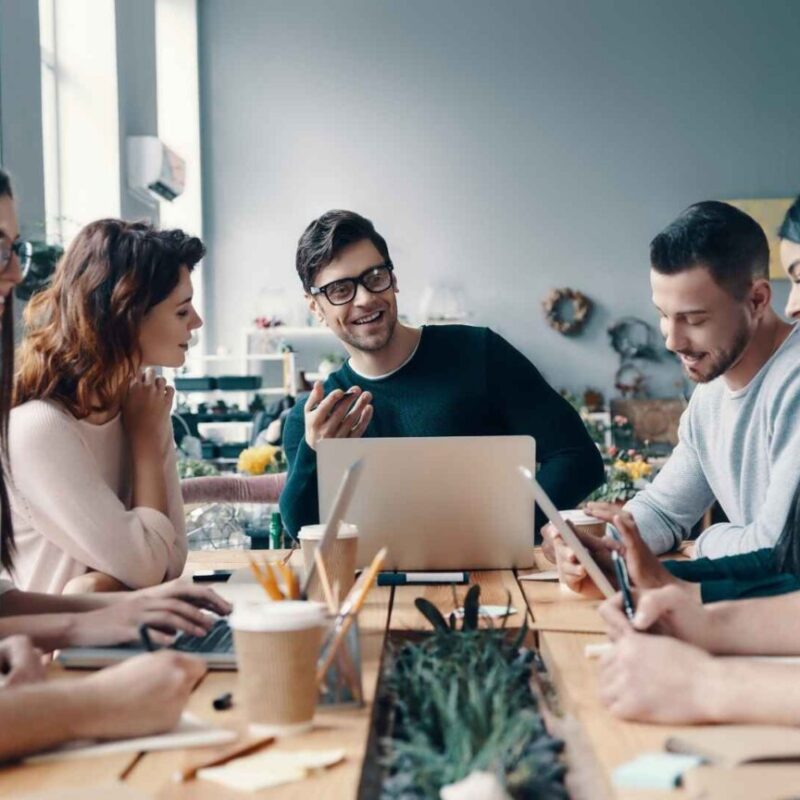marketing team on the table planning their next project 1536x864 1